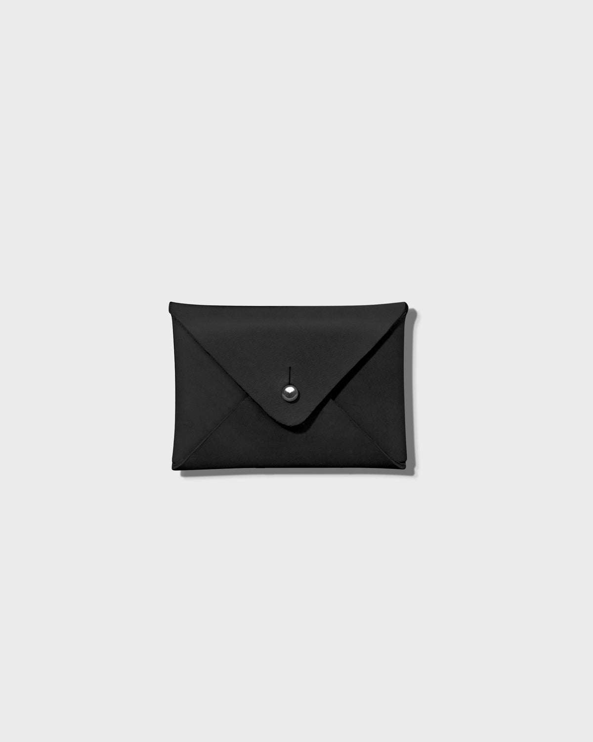Kurvet Wallet made responsibly from vegetable-tanned leather, slim and durable unisex design, eco-friendly wallet built to develop a natural patina over time by BADI Culture.